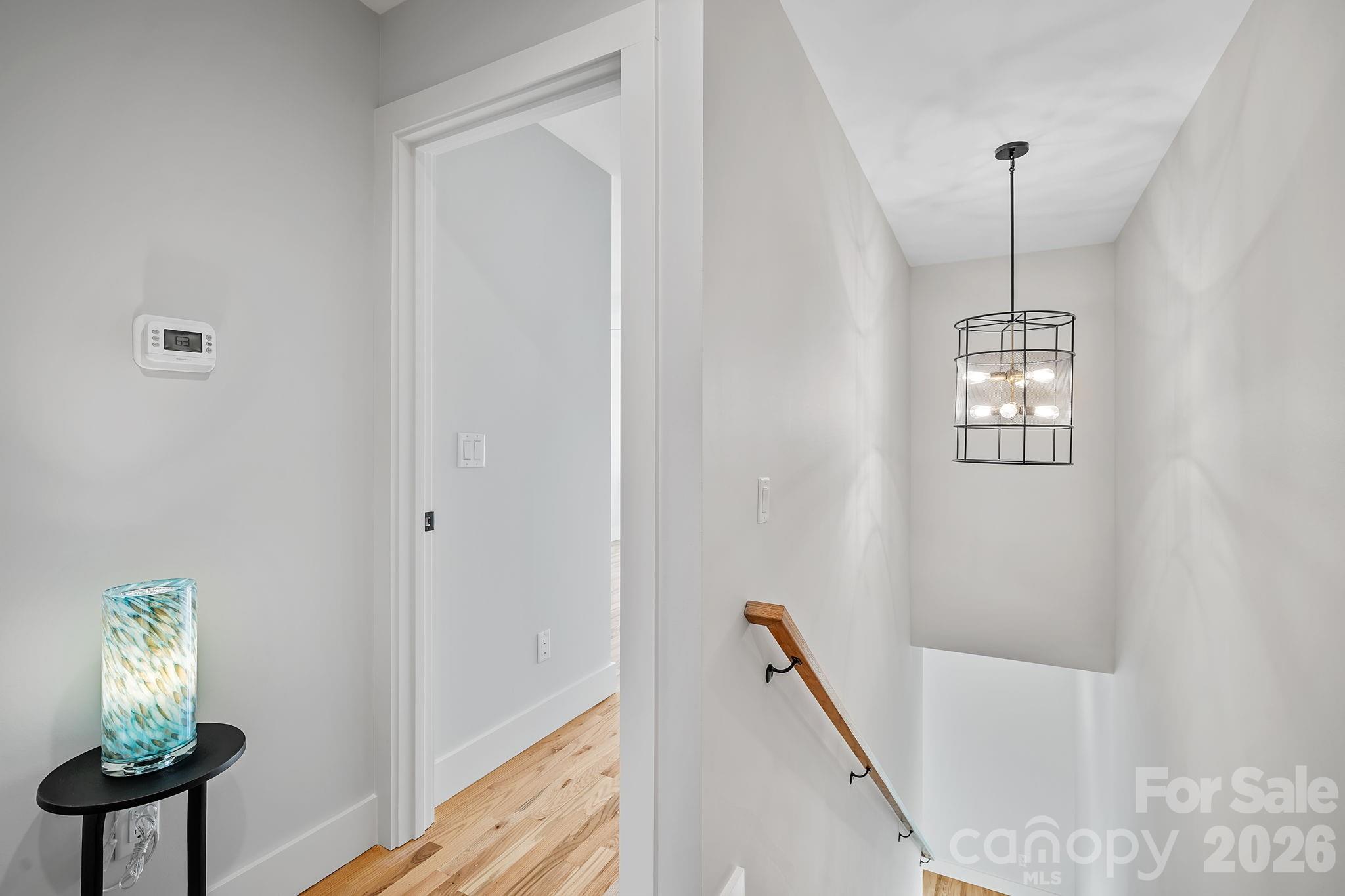 5 Gudger Road Asheville, NC 28715 - Photo 21 of 47 a view of a hallway with windows