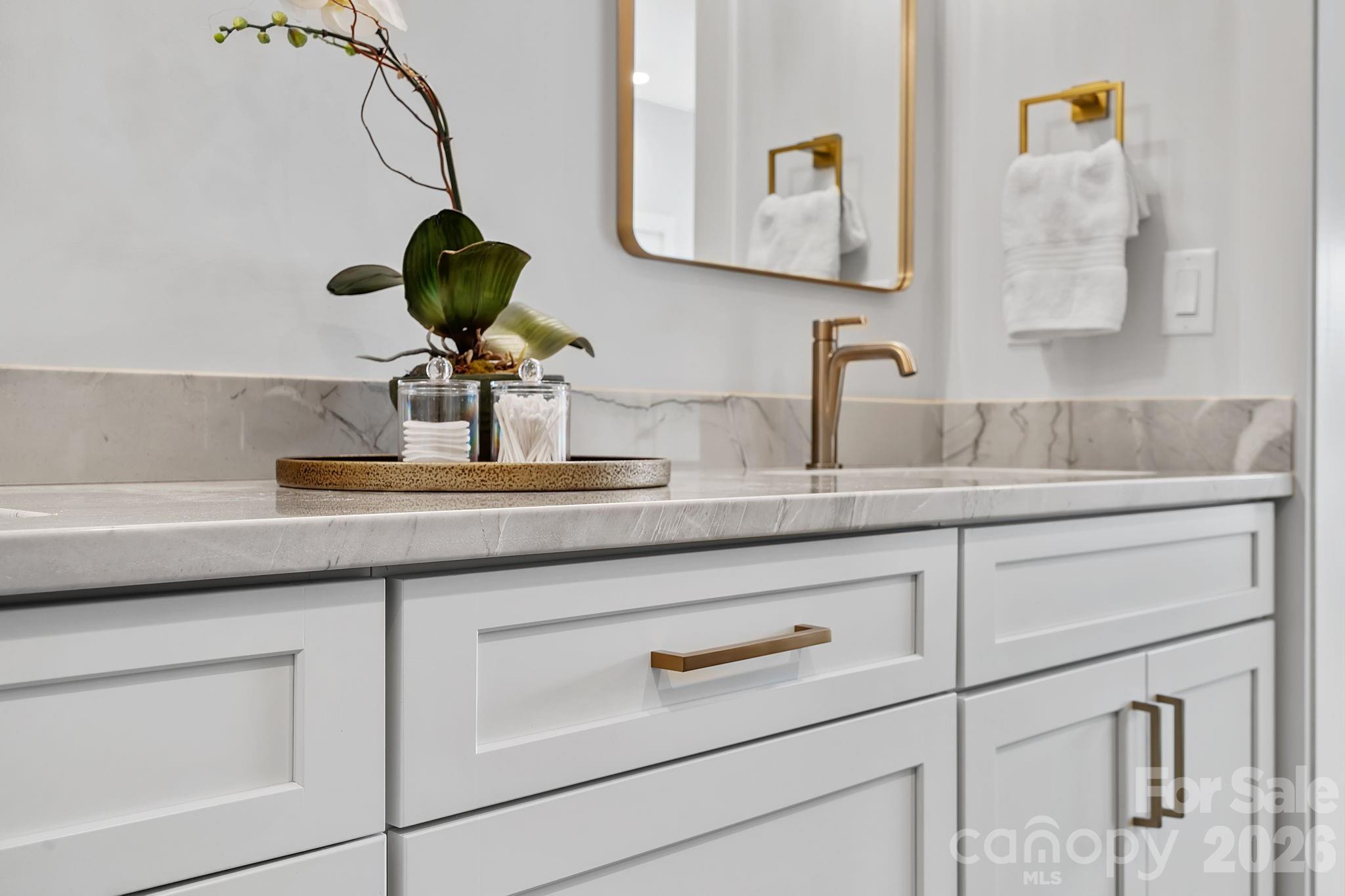 5 Gudger Road Asheville, NC 28715 - Photo 29 of 47 a bathroom with a sink and a mirror