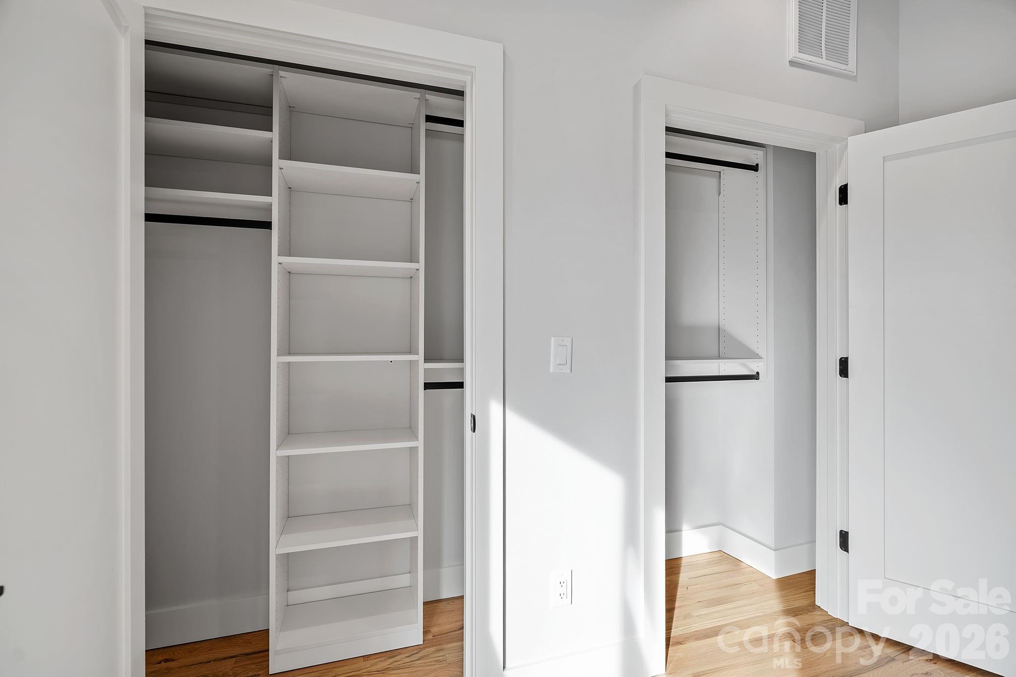 5 Gudger Road Asheville, NC 28715 - Photo 33 of 47 a view of walk in closet with empty racks