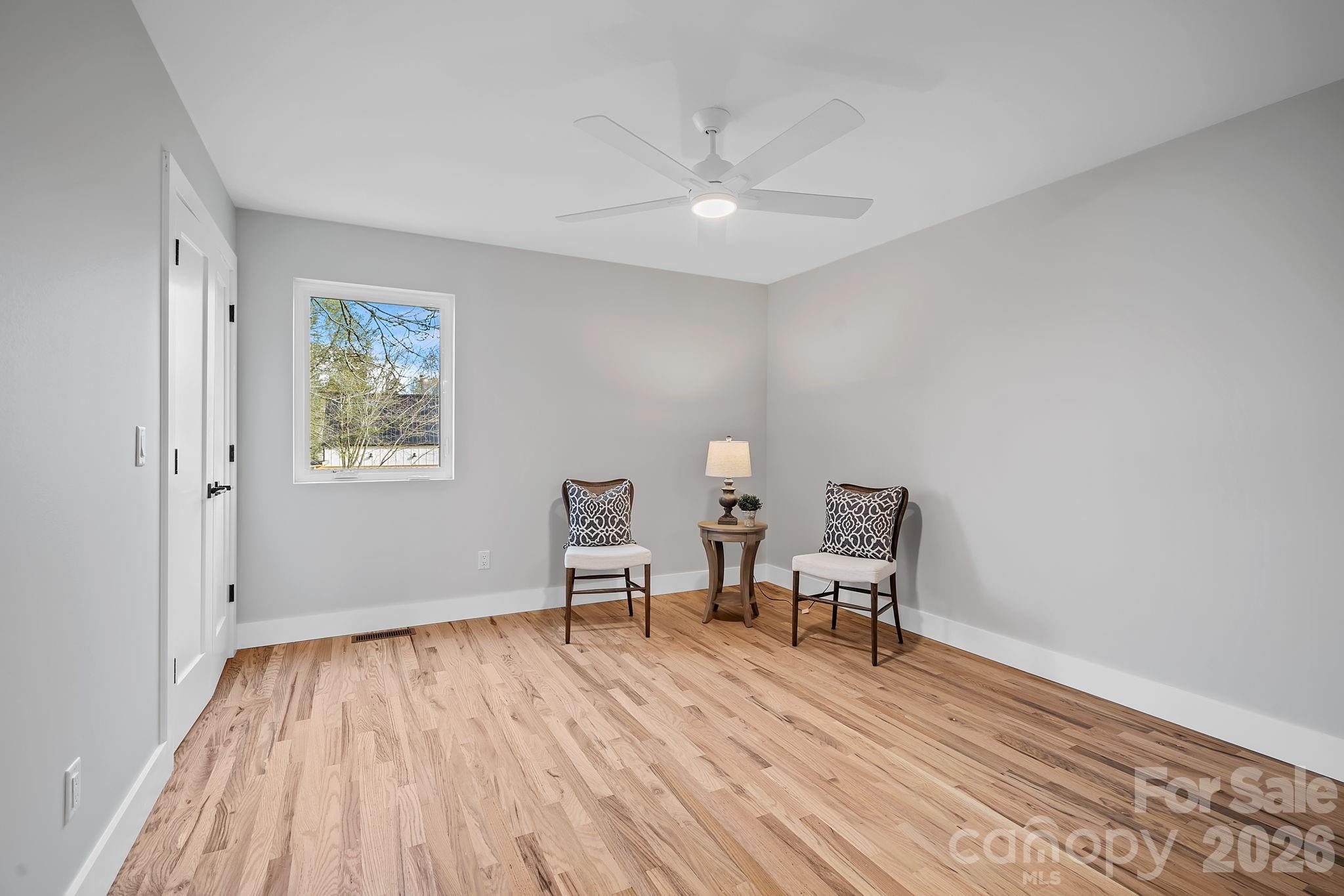 5 Gudger Road Asheville, NC 28715 - Photo 40 of 47 a view of a livingroom with wooden floor and a window