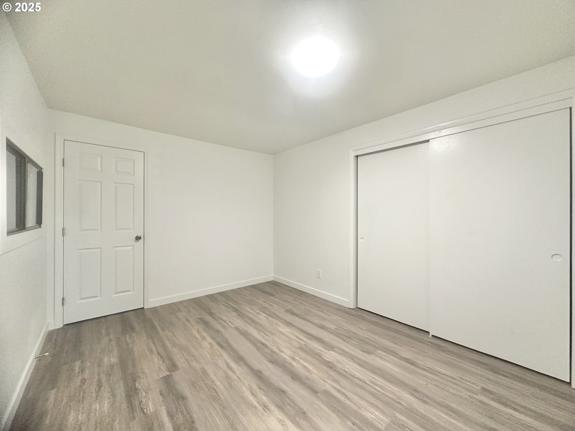 18505 Southeast Clinton Street Gresham, OR 97030 - Photo 19 of 39 wooden floor in an empty room