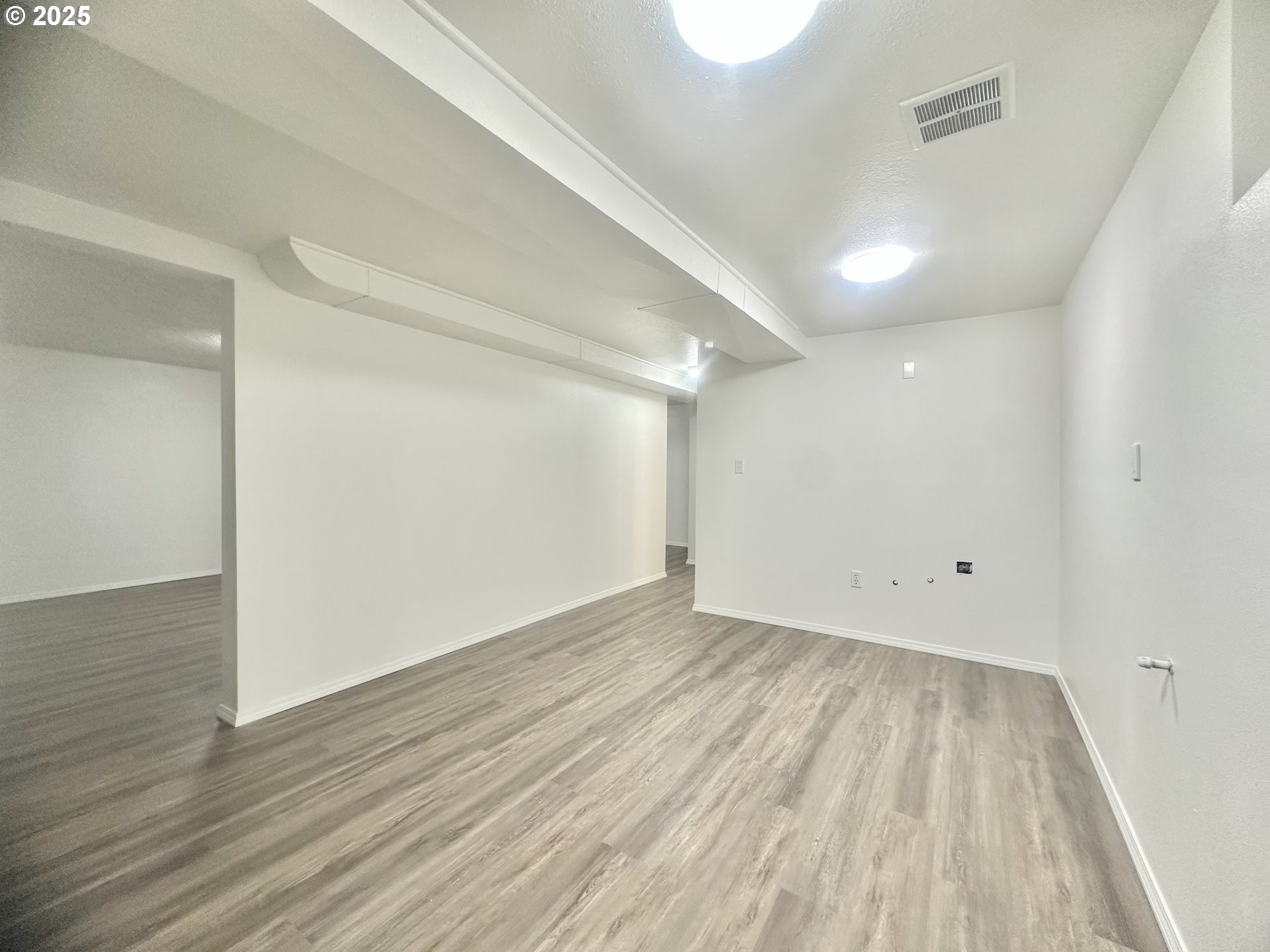 18505 Southeast Clinton Street Gresham, OR 97030 - Photo 23 of 39 a view of room with wooden floor