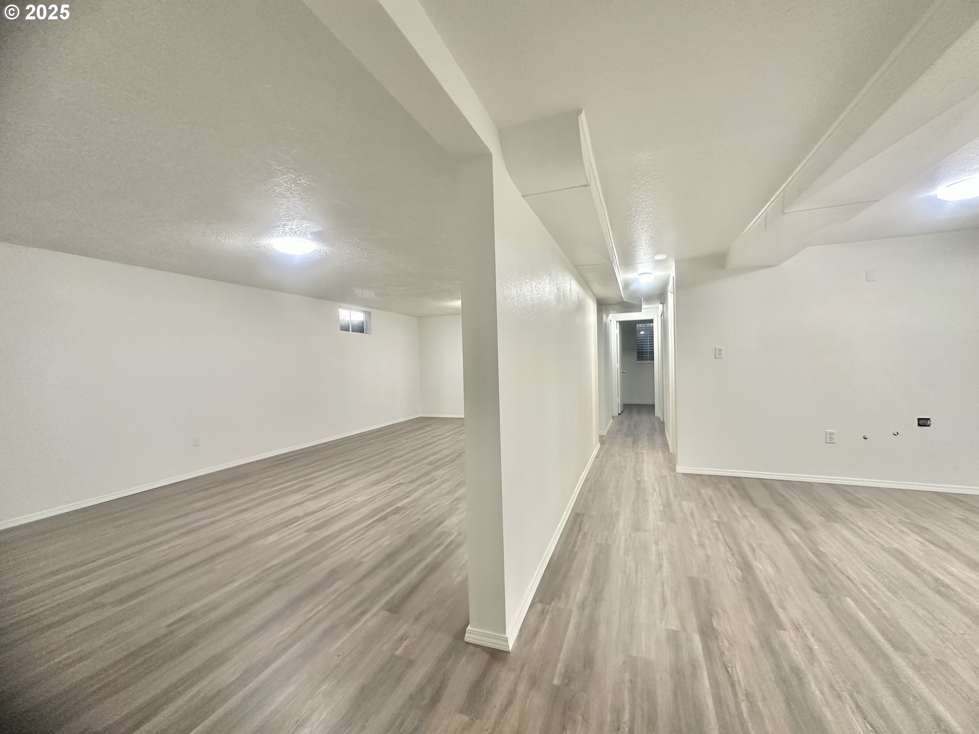18505 Southeast Clinton Street Gresham, OR 97030 - Photo 24 of 39 a view of a hallway with wooden floor