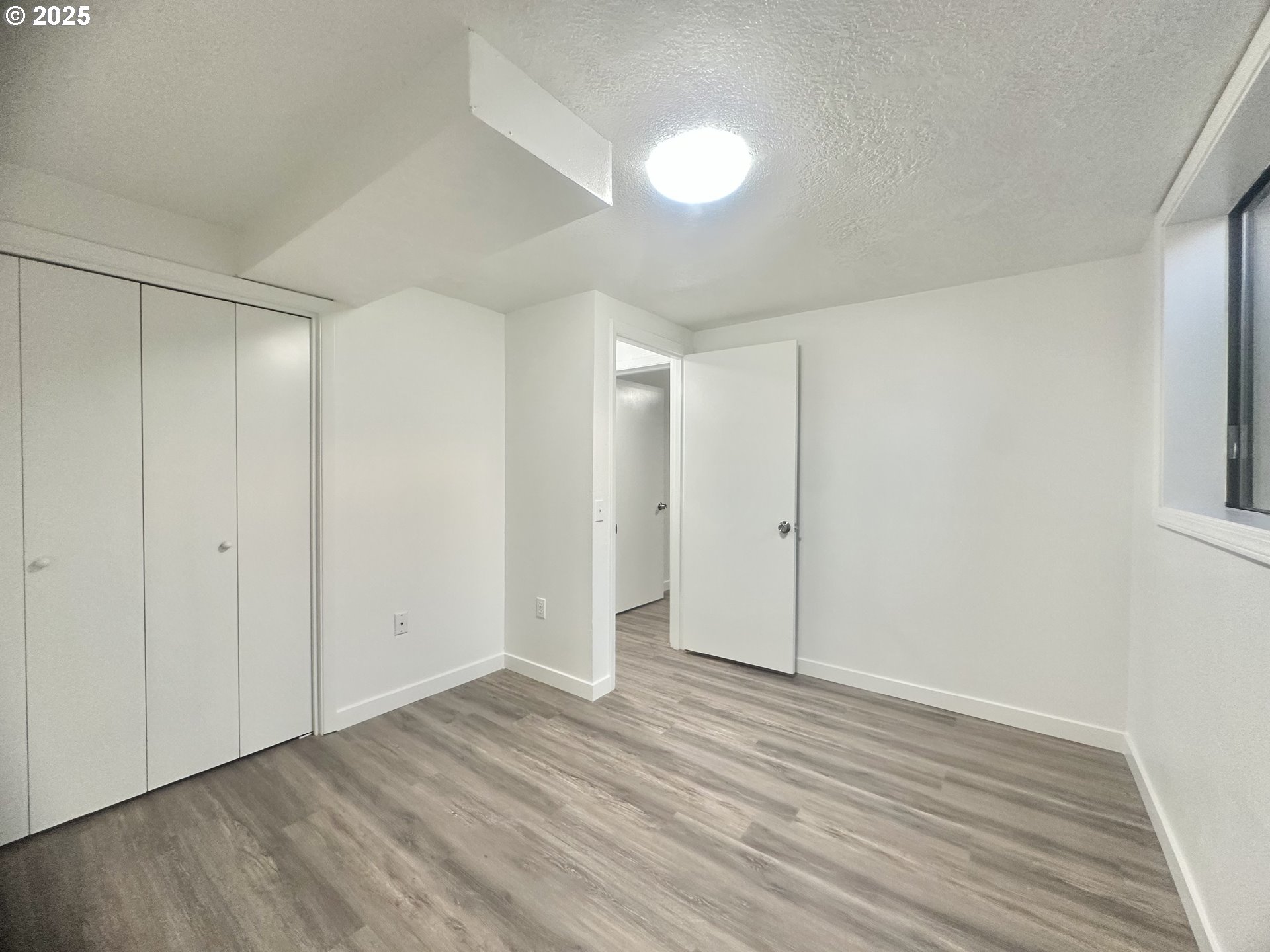 18505 Southeast Clinton Street Gresham, OR 97030 - Photo 30 of 39 a view of an empty room and wooden floor