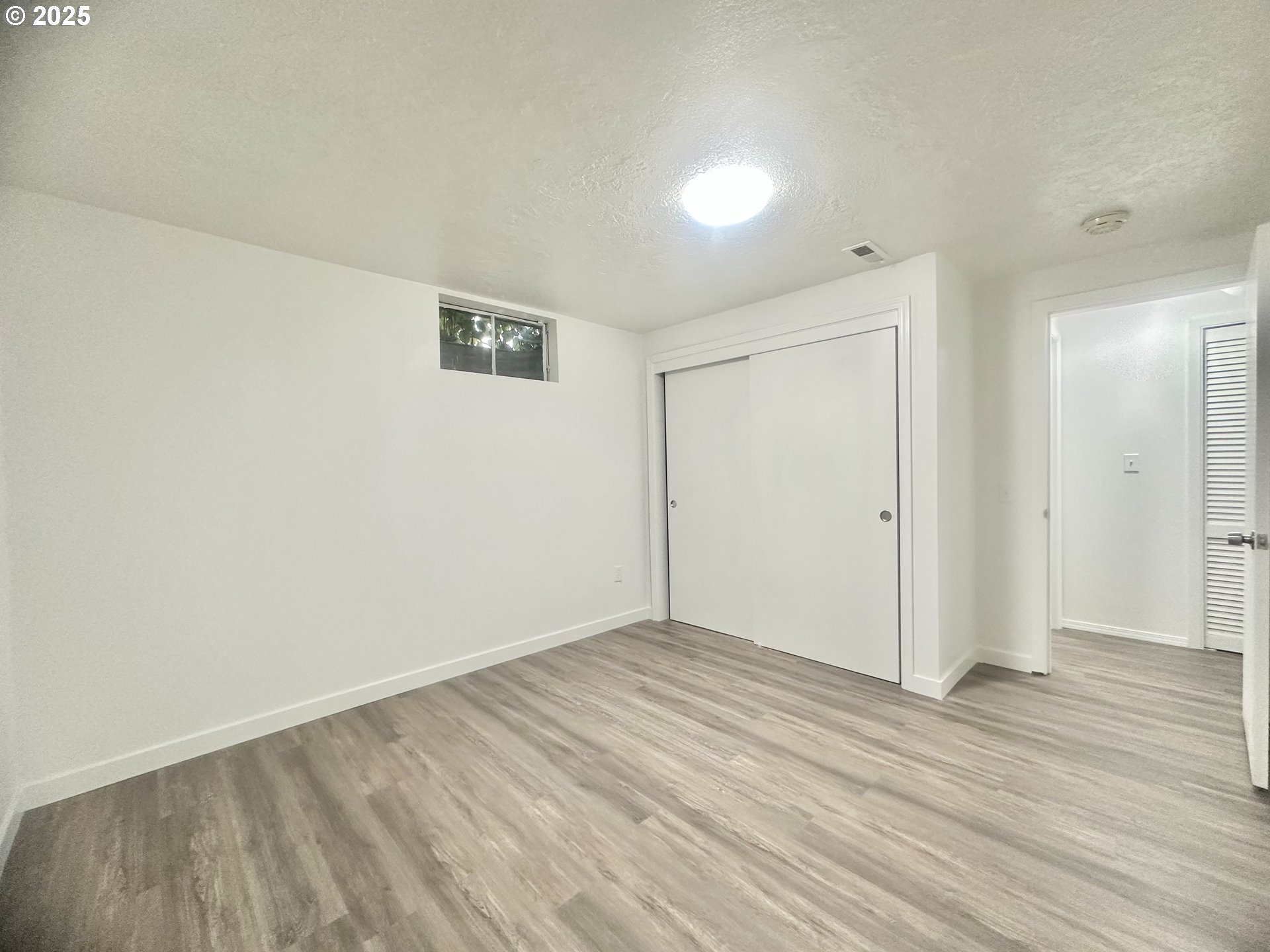 18505 Southeast Clinton Street Gresham, OR 97030 - Photo 32 of 39 wooden floor in an empty room