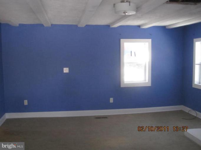 1335 Bruceville Road Keymar, MD 21757 - Photo 5 of 16 a view of an empty room with a window