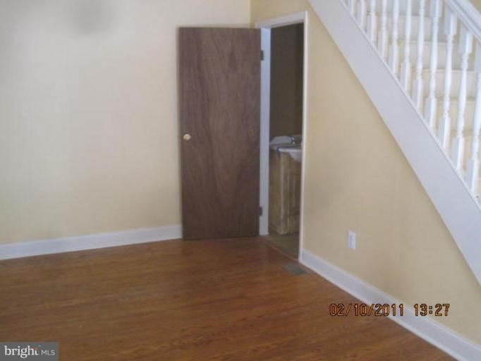 1335 Bruceville Road Keymar, MD 21757 - Photo 8 of 16 a view of an empty room with wooden floor