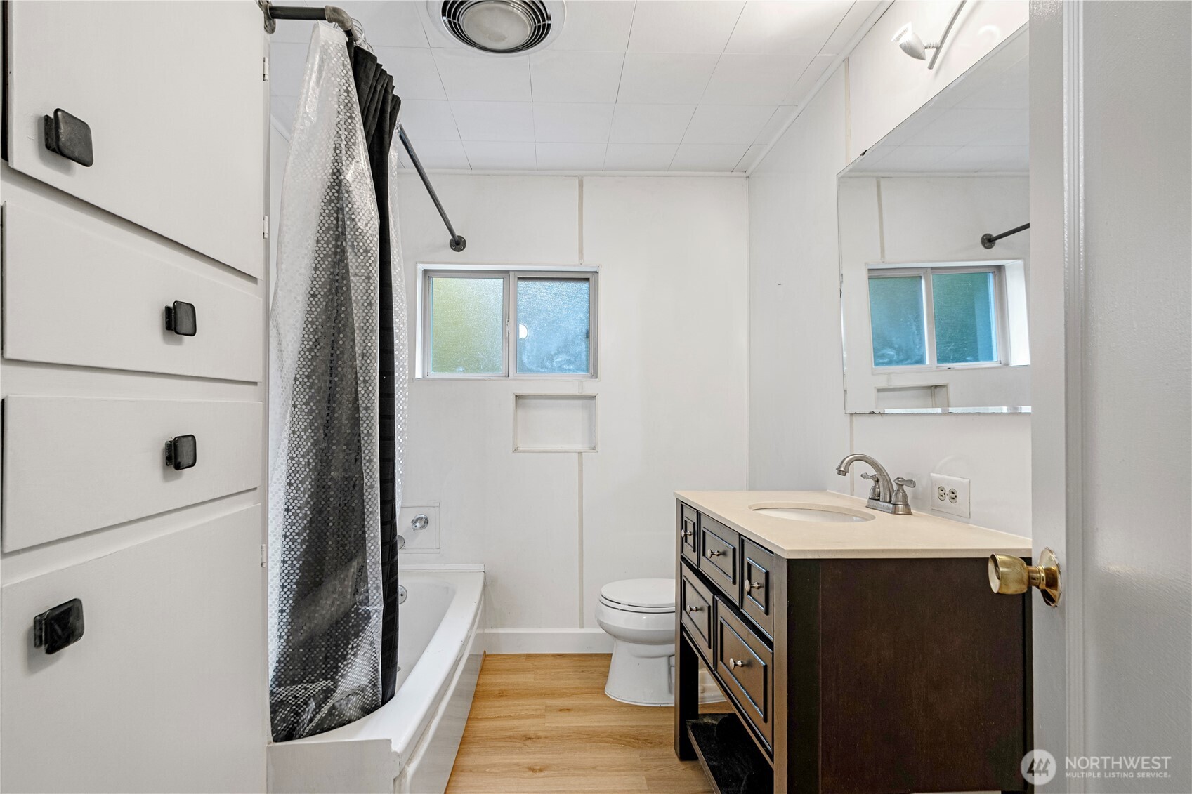 22504 Dorre Don Way Southeast Maple Valley, WA 98038 - Photo 16 of 21 a bathroom with a sink a toilet and shower