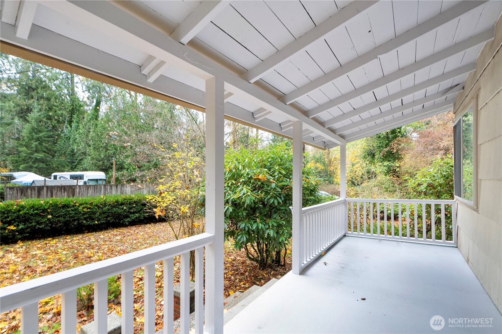 22504 Dorre Don Way Southeast Maple Valley, WA 98038 - Photo 4 of 21 a view of a porch with furniture and garden
