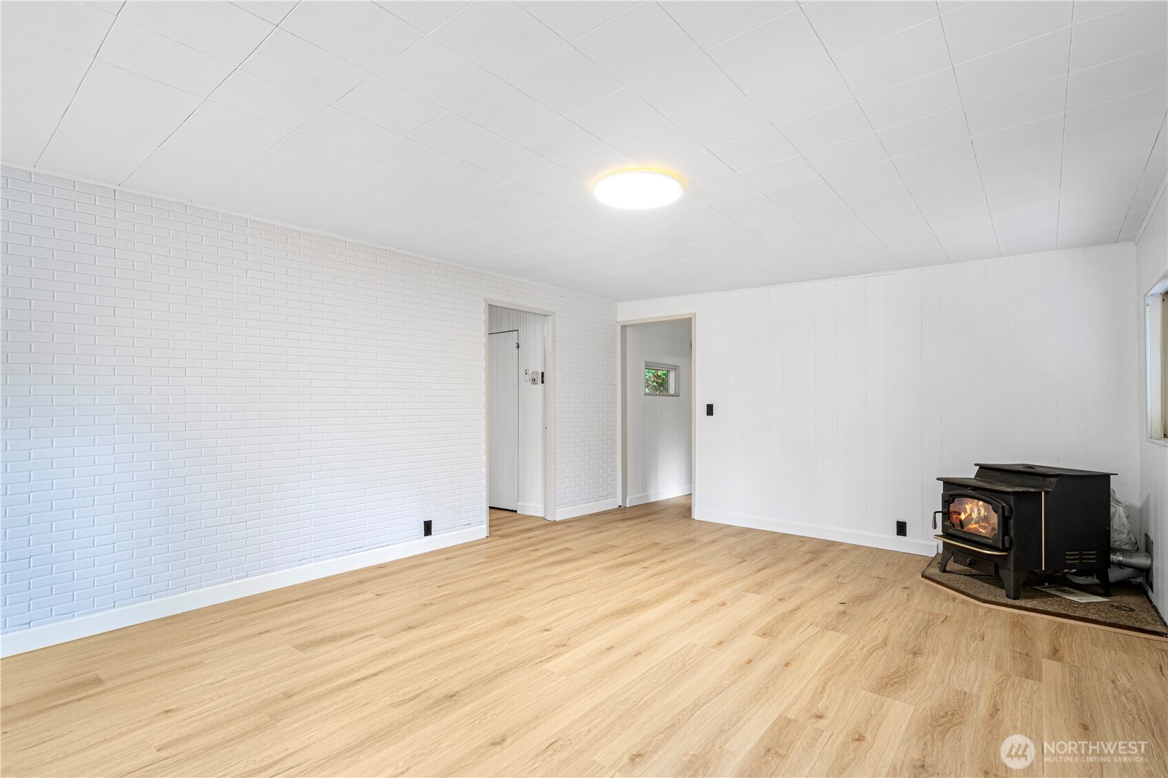 22504 Dorre Don Way Southeast Maple Valley, WA 98038 - Photo 7 of 21 a view of empty room with wooden floor