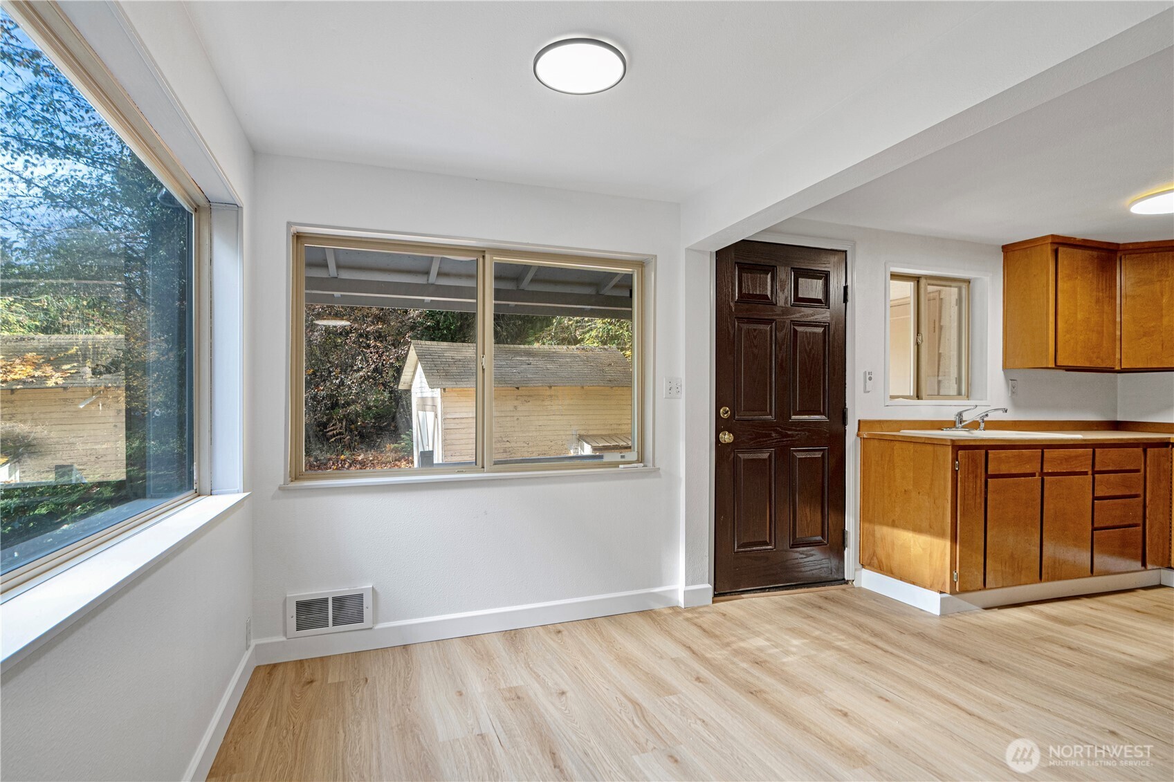 22504 Dorre Don Way Southeast Maple Valley, WA 98038 - Photo 10 of 21 an empty room with windows and closet