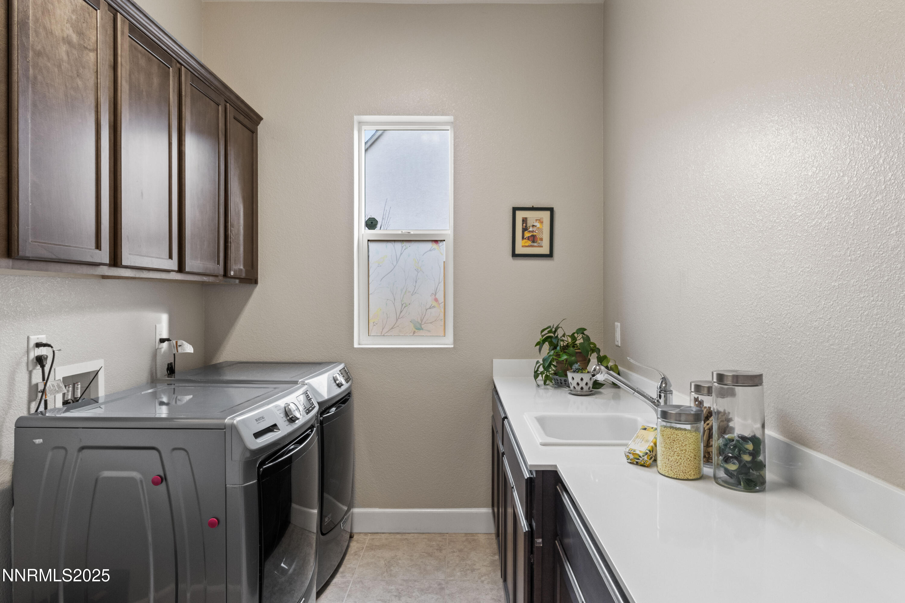 13510 Water Willow Street Reno, NV 89521 - Photo 37 of 56 a kitchen that has a sink and a stove