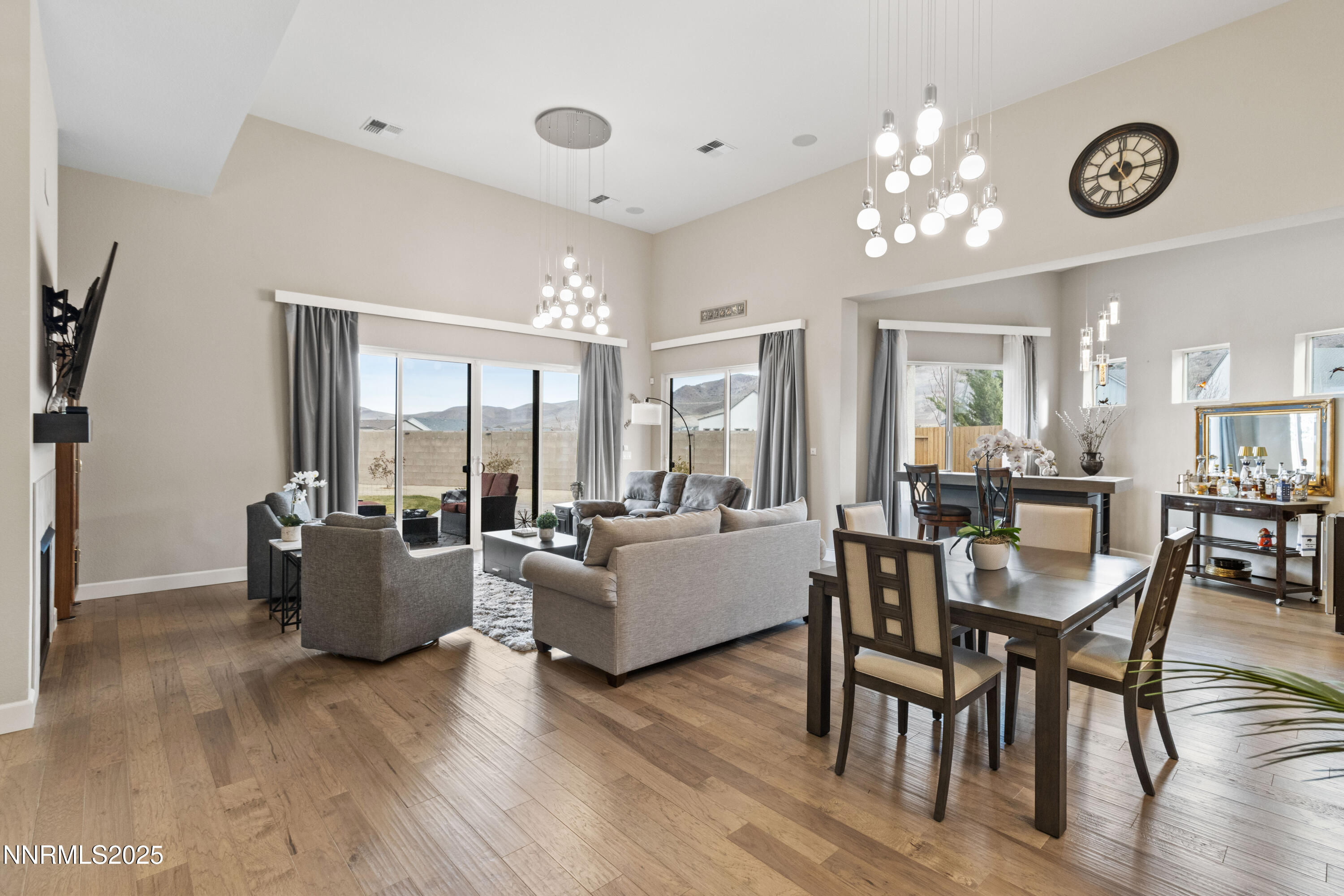 13510 Water Willow Street Reno, NV 89521 - Photo 8 of 56 a living room with furniture and a large window