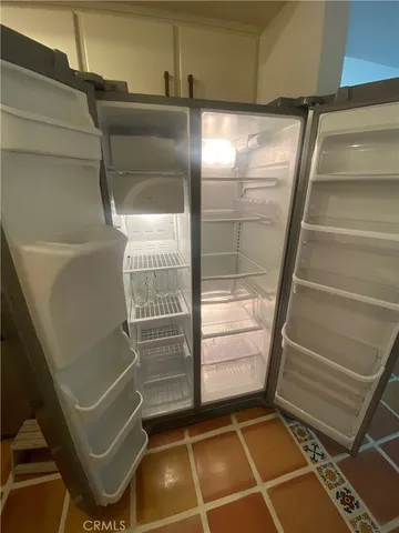an aerial view of a house with a lake view