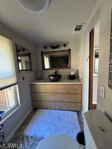 a room with a couch and a window