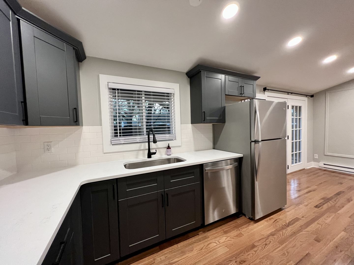 515 South Street Lockport, IL 60441 - Photo 4 of 22 a kitchen with stainless steel appliances granite countertop a refrigerator a sink and a stove