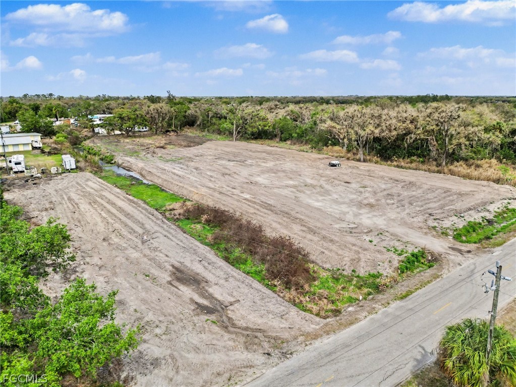 1097 Ct Line Road LaBelle, FL 33935 - Photo 1 of 11 a view of a road with a building in the background