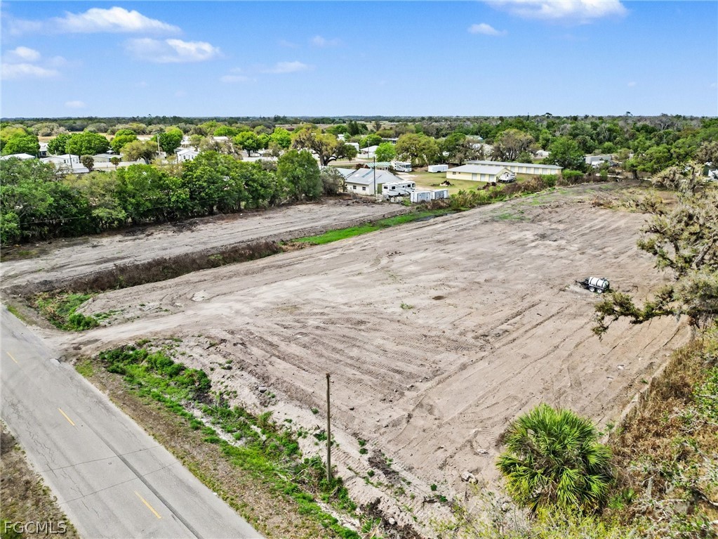 1097 Ct Line Road LaBelle, FL 33935 - Photo 2 of 11 a view of a road with an ocean beach