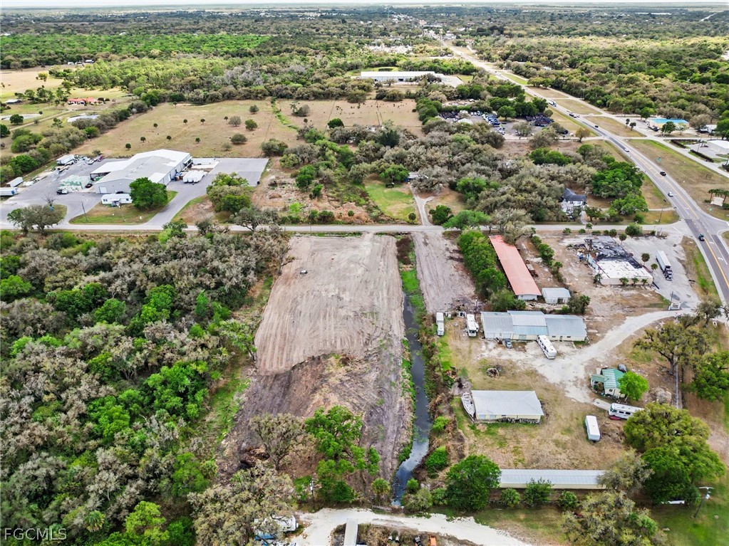 1097 Ct Line Road LaBelle, FL 33935 - Photo 3 of 11 an aerial view of residential houses with outdoor space