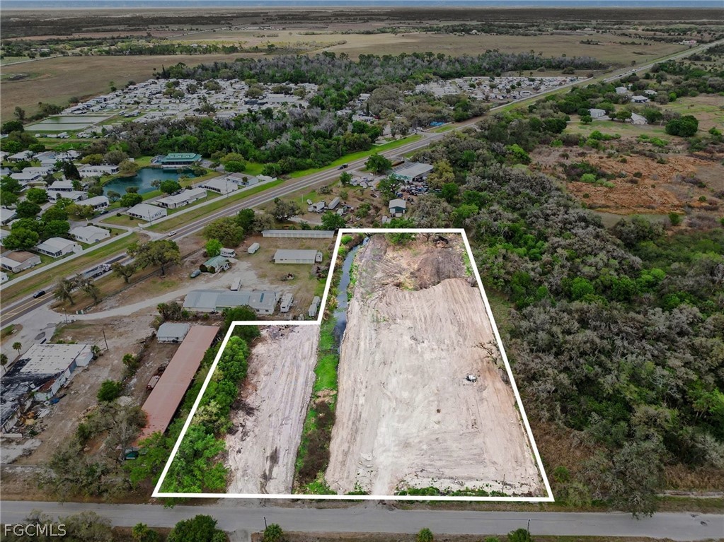 1097 Ct Line Road LaBelle, FL 33935 - Photo 6 of 11 an aerial view of a residential houses with outdoor space