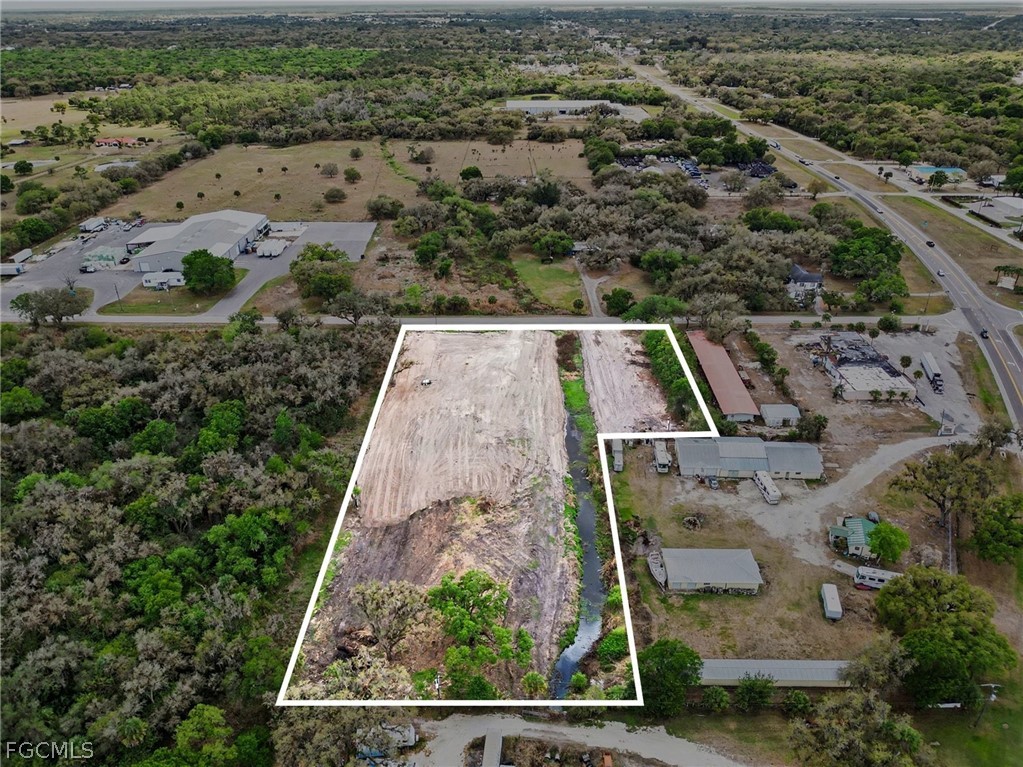 1097 Ct Line Road LaBelle, FL 33935 - Photo 7 of 11 an aerial view of a yard
