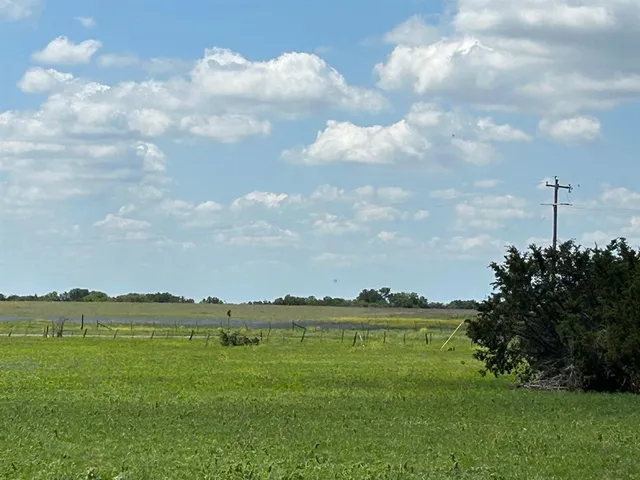 a view of a golf course with a lake