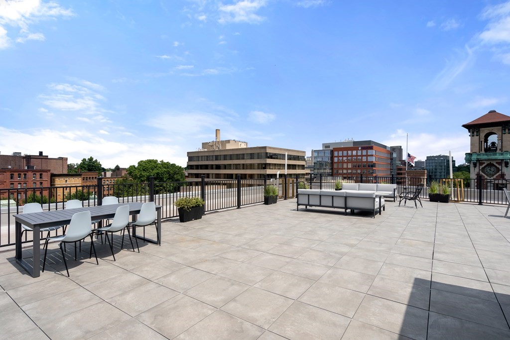 69 Walnut Street, Unit 15 Brookline, MA 02445 - Photo 11 of 21 a view of a terrace with sitting area