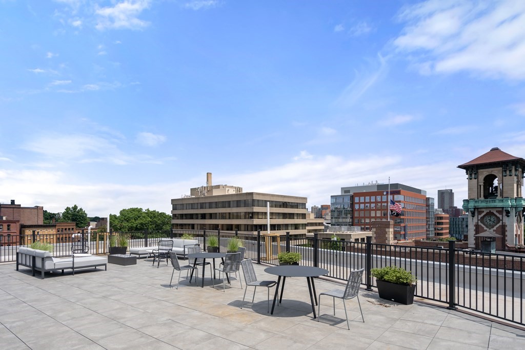 69 Walnut Street, Unit 15 Brookline, MA 02445 - Photo 12 of 21 a view of a terrace with sitting area