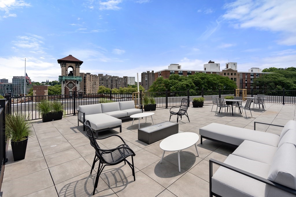 69 Walnut Street, Unit 15 Brookline, MA 02445 - Photo 15 of 21 a view of a terrace with furniture