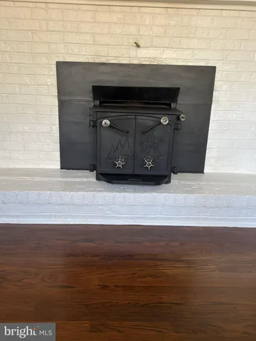 a living room with a fireplace