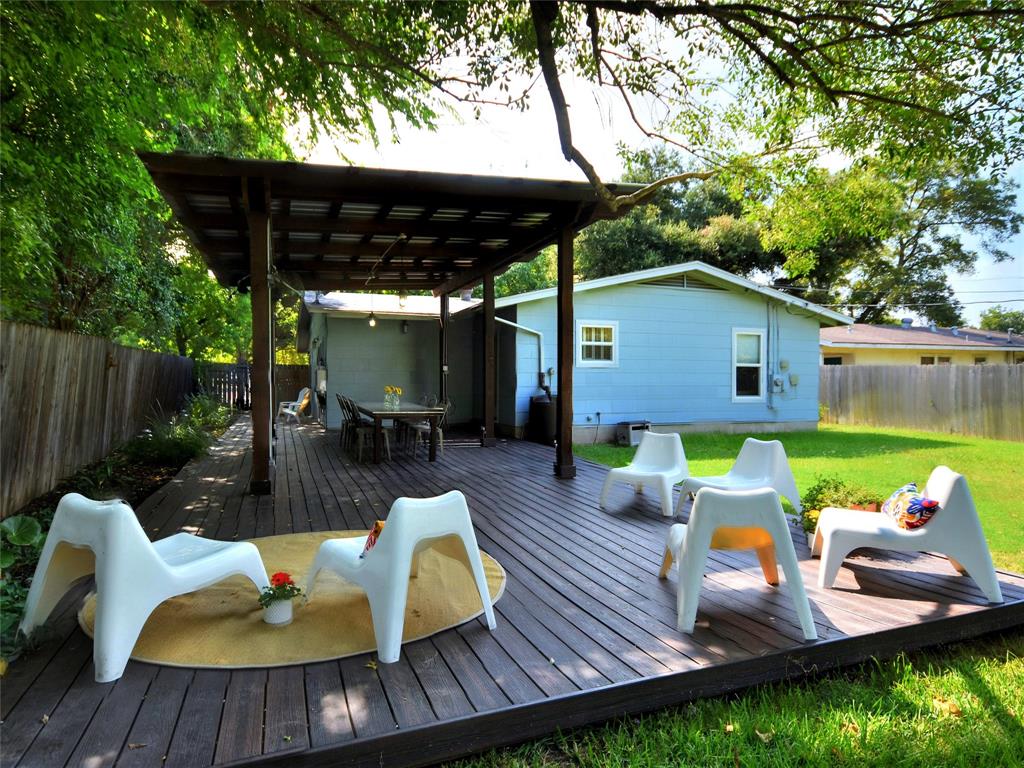 a view of outdoor sitting space with furniture