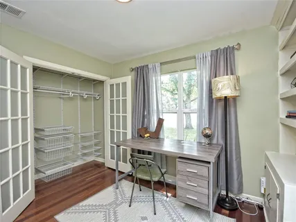 a room with furniture and a window