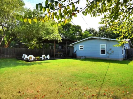 a view of a backyard with a garden