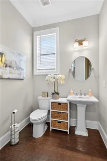 a spacious bathroom with a sink a mirror and a bathtub