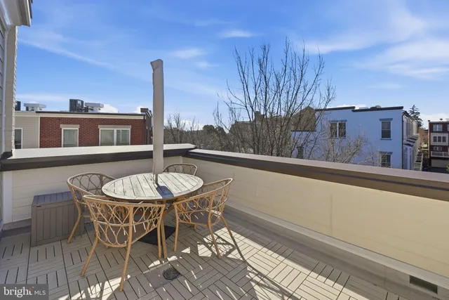 a view of a terrace with sitting area