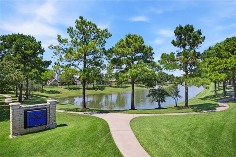 a view of a garden with a lake