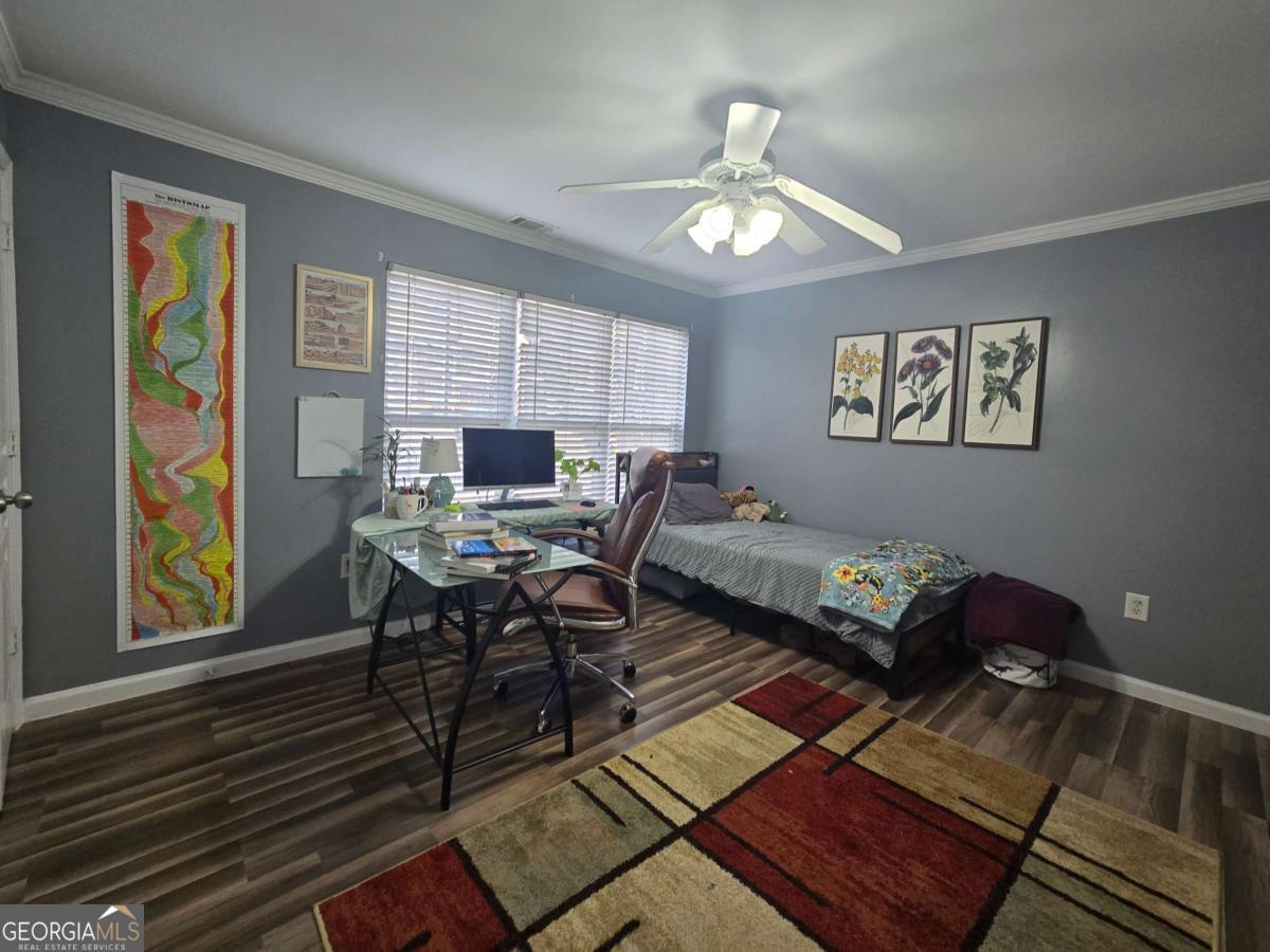 490 Barnett Shoals Road, Unit 205 Athens, GA 30605 - Photo 13 of 19 a living room with furniture and a window
