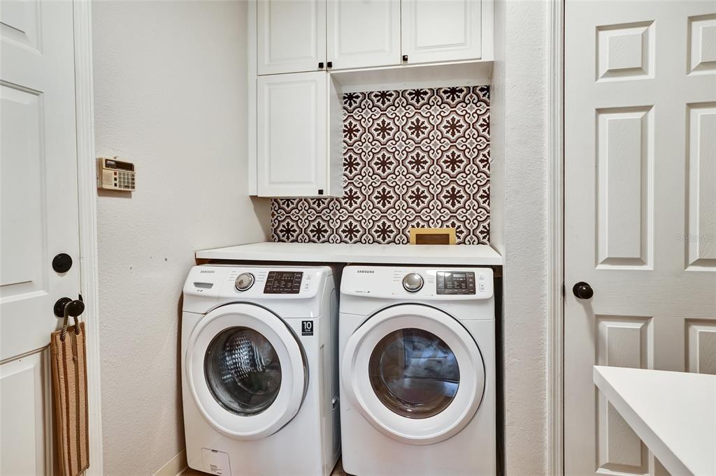 4902 Jenni Lin Court Valrico, FL 33596 - Photo 41 of 56 a utility room with dryer and washer