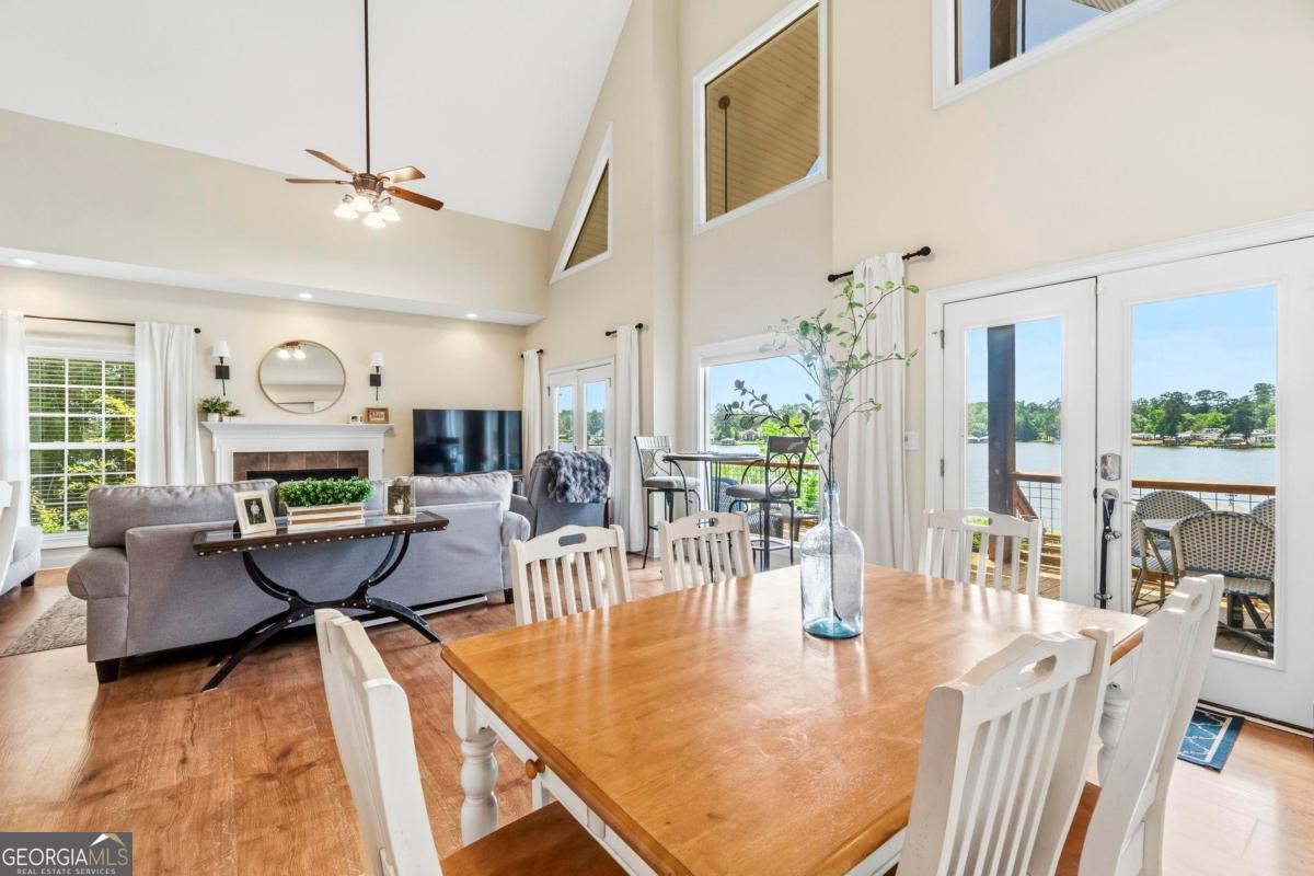172 Mays Road Milledgeville, GA 31061 - Photo 14 of 54 a view of a dining room with furniture window and wooden floor