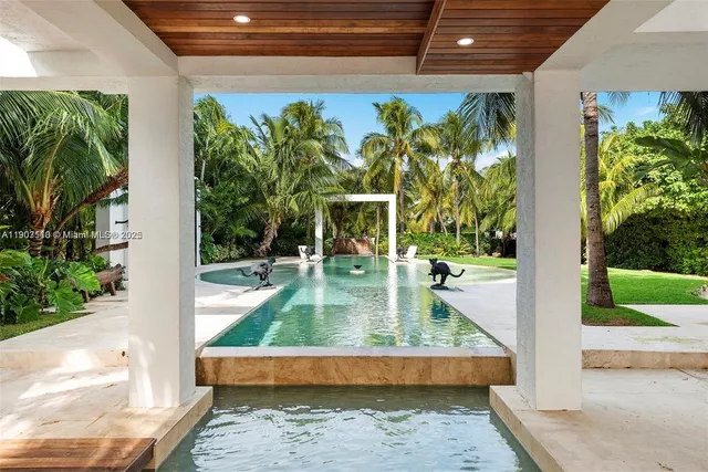 a kitchen with a sink cabinets and window