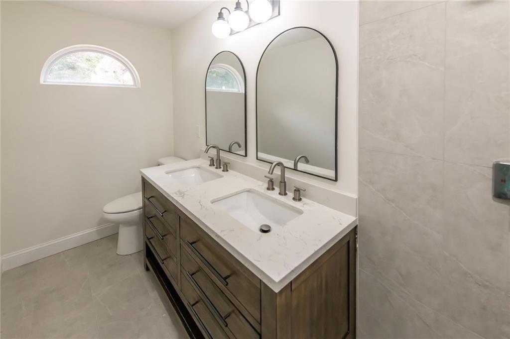 3819 Mason Creek Road Winston, GA 30187 - Photo 19 of 54 a bathroom with a sink and a mirror
