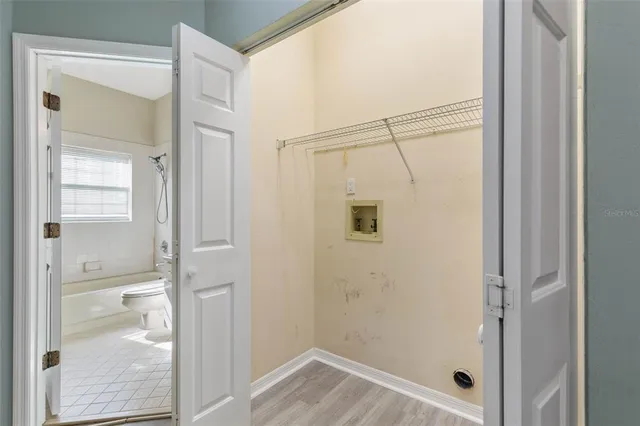 an empty room with windows