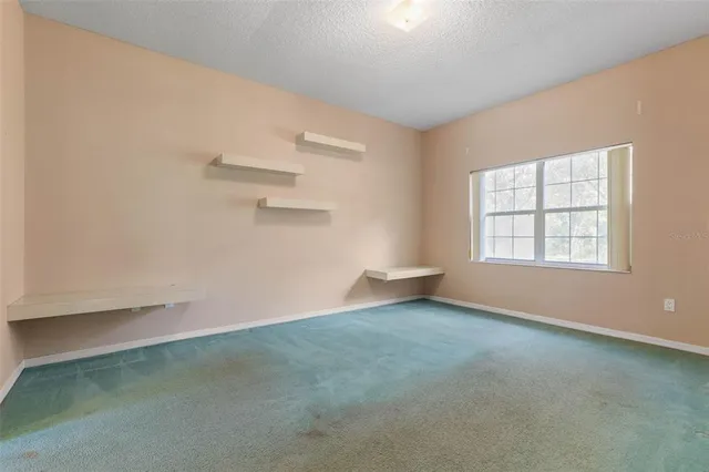 an empty room with a window