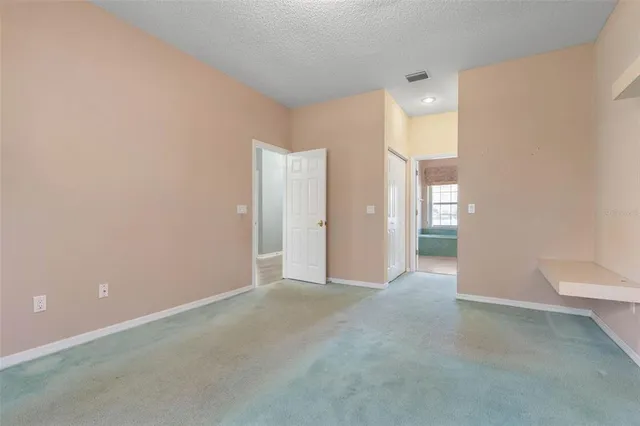 a bathroom with a shower a bathtub and a shower