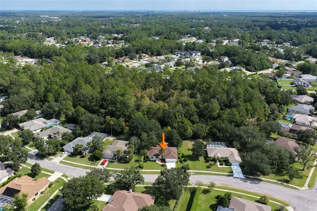 an aerial view of a city with lots of residential buildings