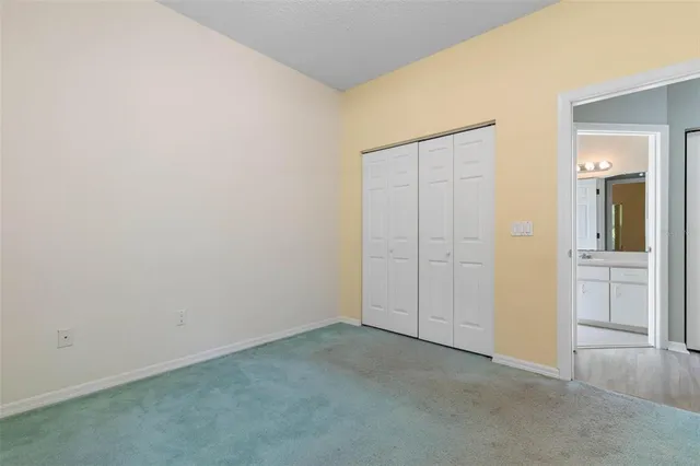 a bathroom with a sink toilet a mirror and shower