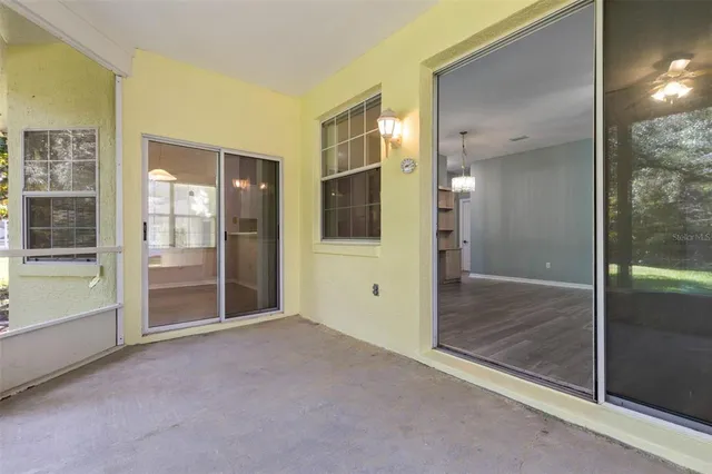 a view of a field with trees