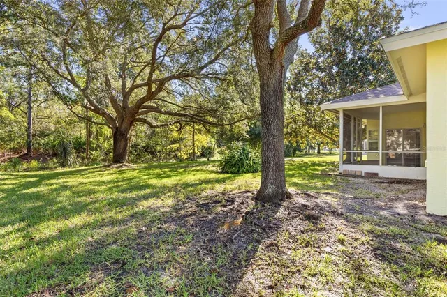 an aerial view of a house with a garden