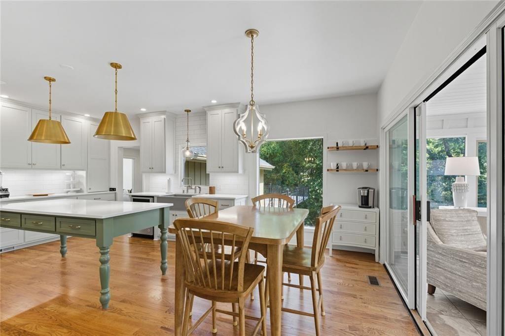 3680 Lamplighters Cove Road Gainesville, GA 30504 - Photo 24 of 88 a view of a dining room with furniture