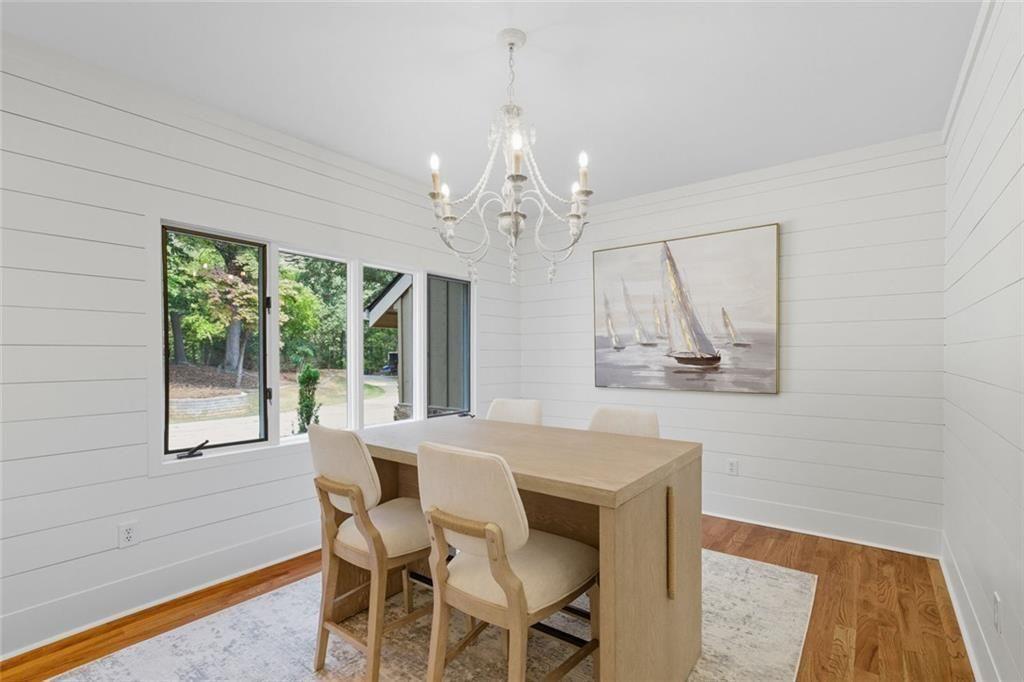 3680 Lamplighters Cove Road Gainesville, GA 30504 - Photo 25 of 88 a view of a dining room with furniture window and outside view